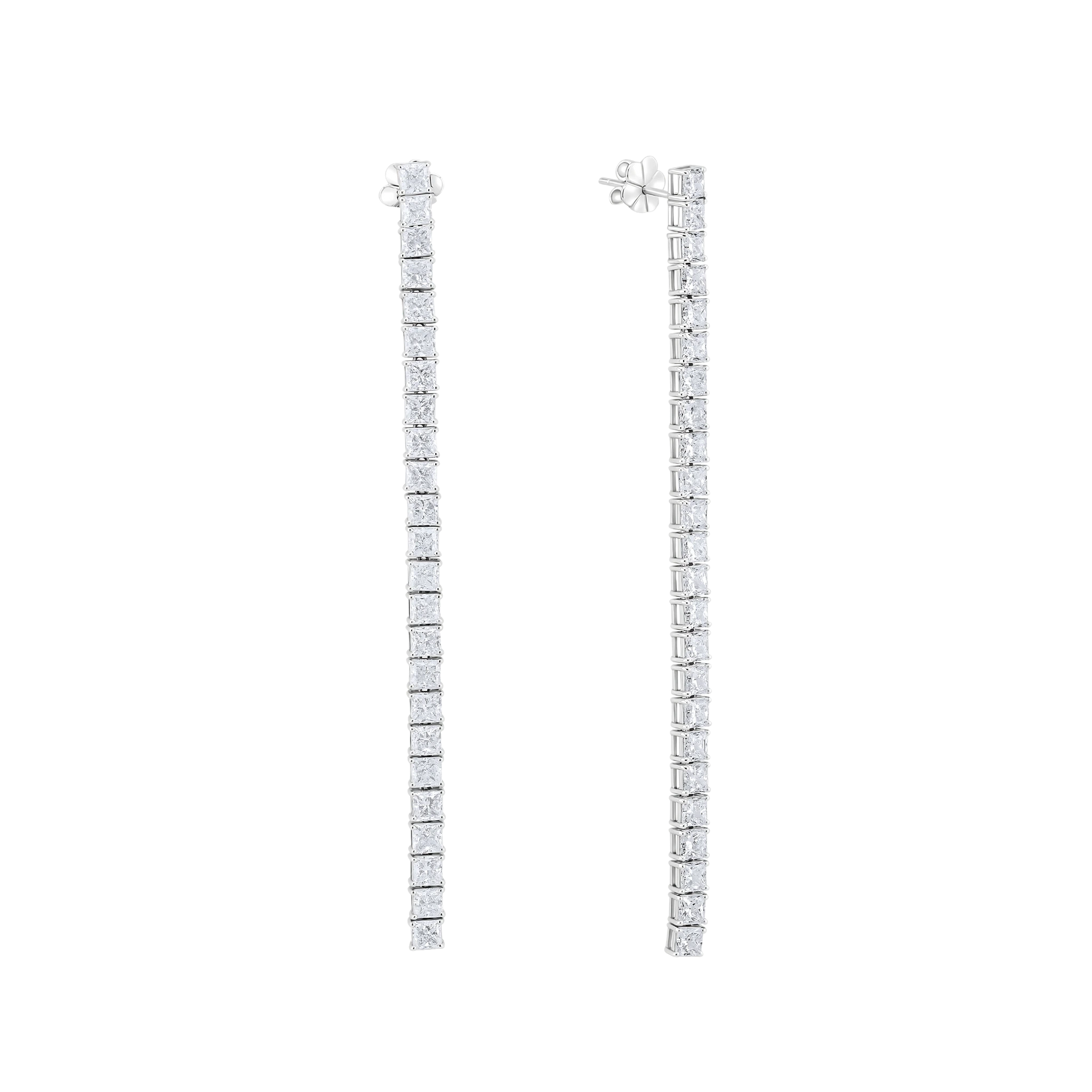 Pair of diamond earrings on a white background