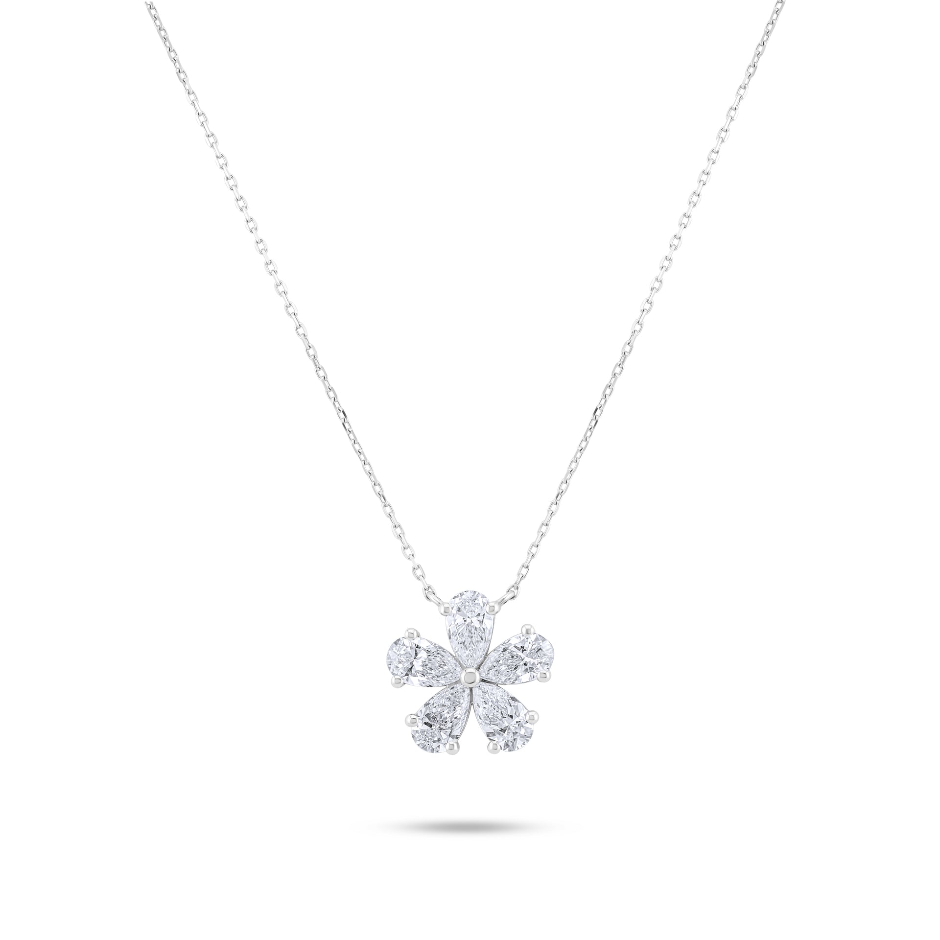 Diamond flower pendant on a chain against a white background