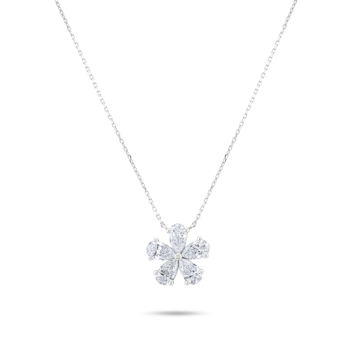 Diamond flower pendant on a chain against a white background