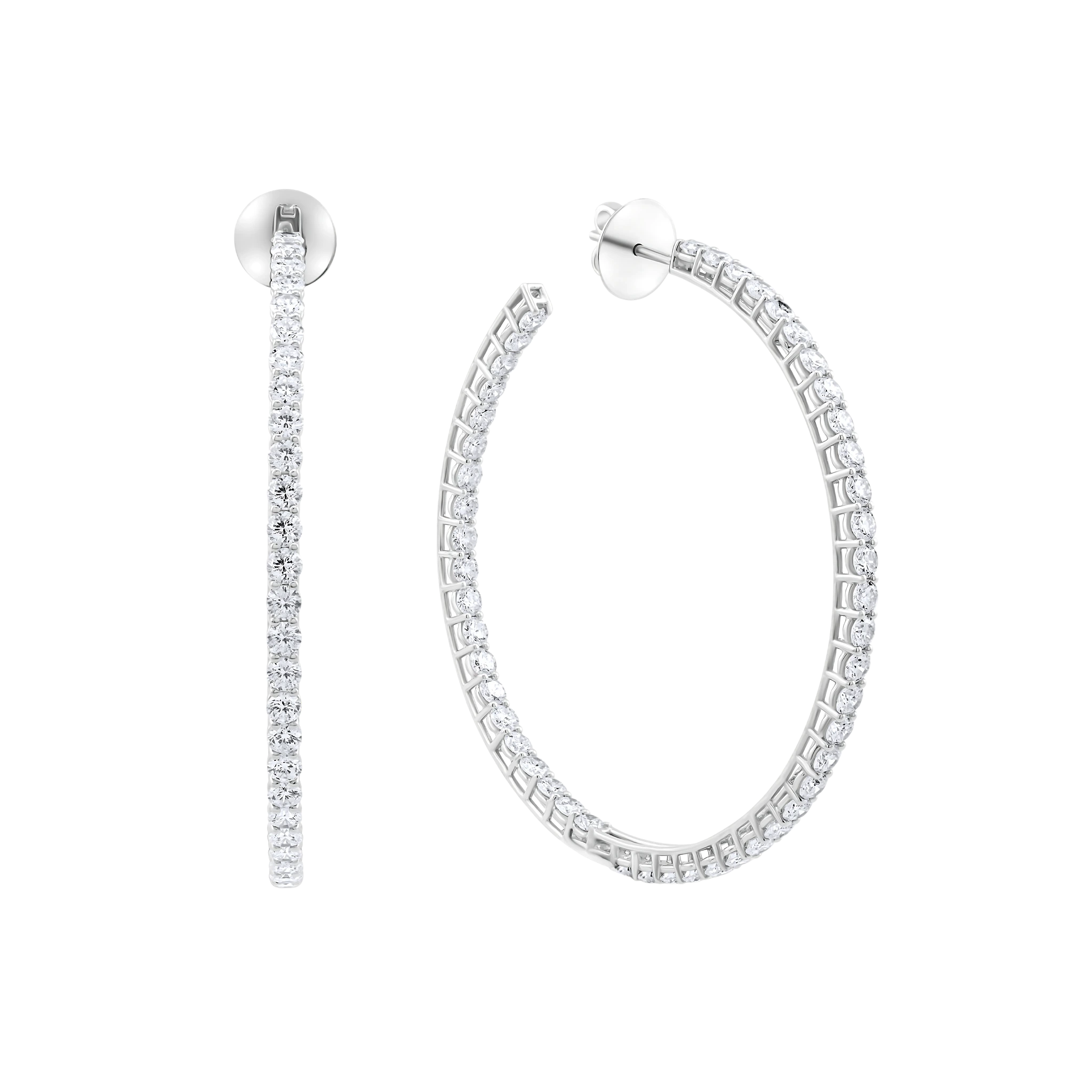 Pair of silver hoop earrings on a white background