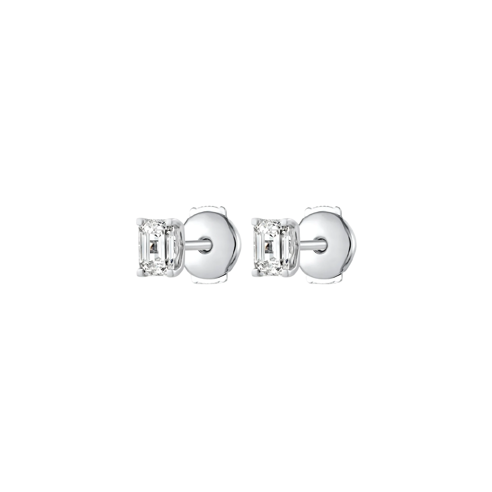 Pair of silver earrings with gemstones on a white background