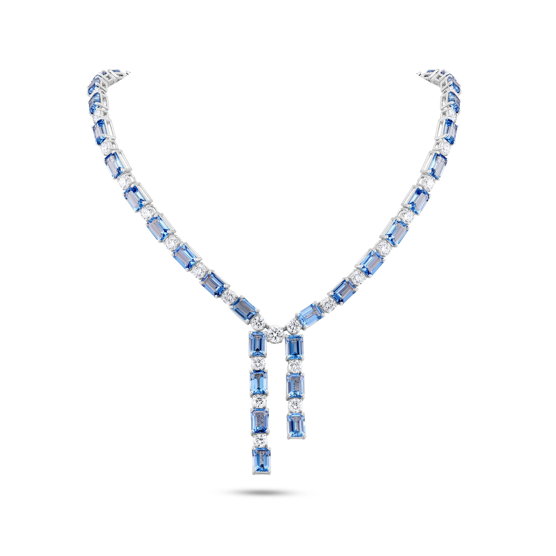 Elegant necklace with blue gemstones on a white background