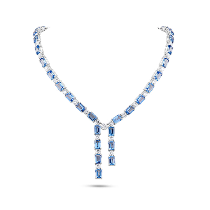 Elegant necklace with blue gemstones on a white background