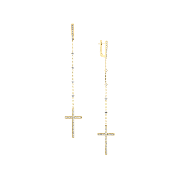 Gold cross earrings on a white background