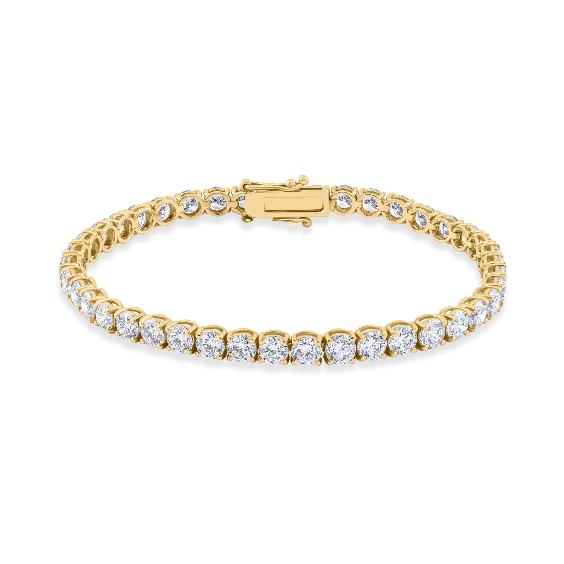 Gold bracelet with clear stones on a white background