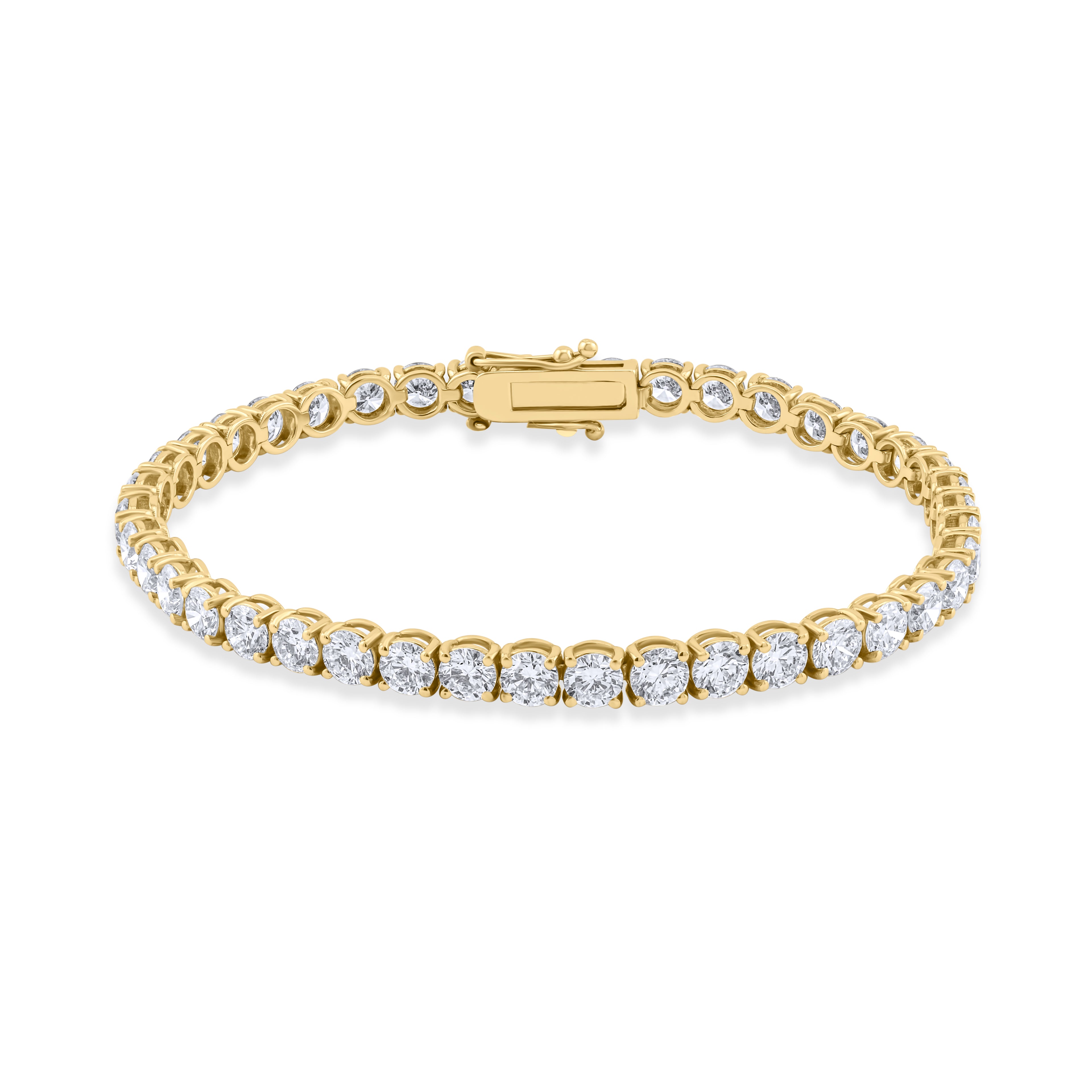 Gold bracelet with clear stones on a white background