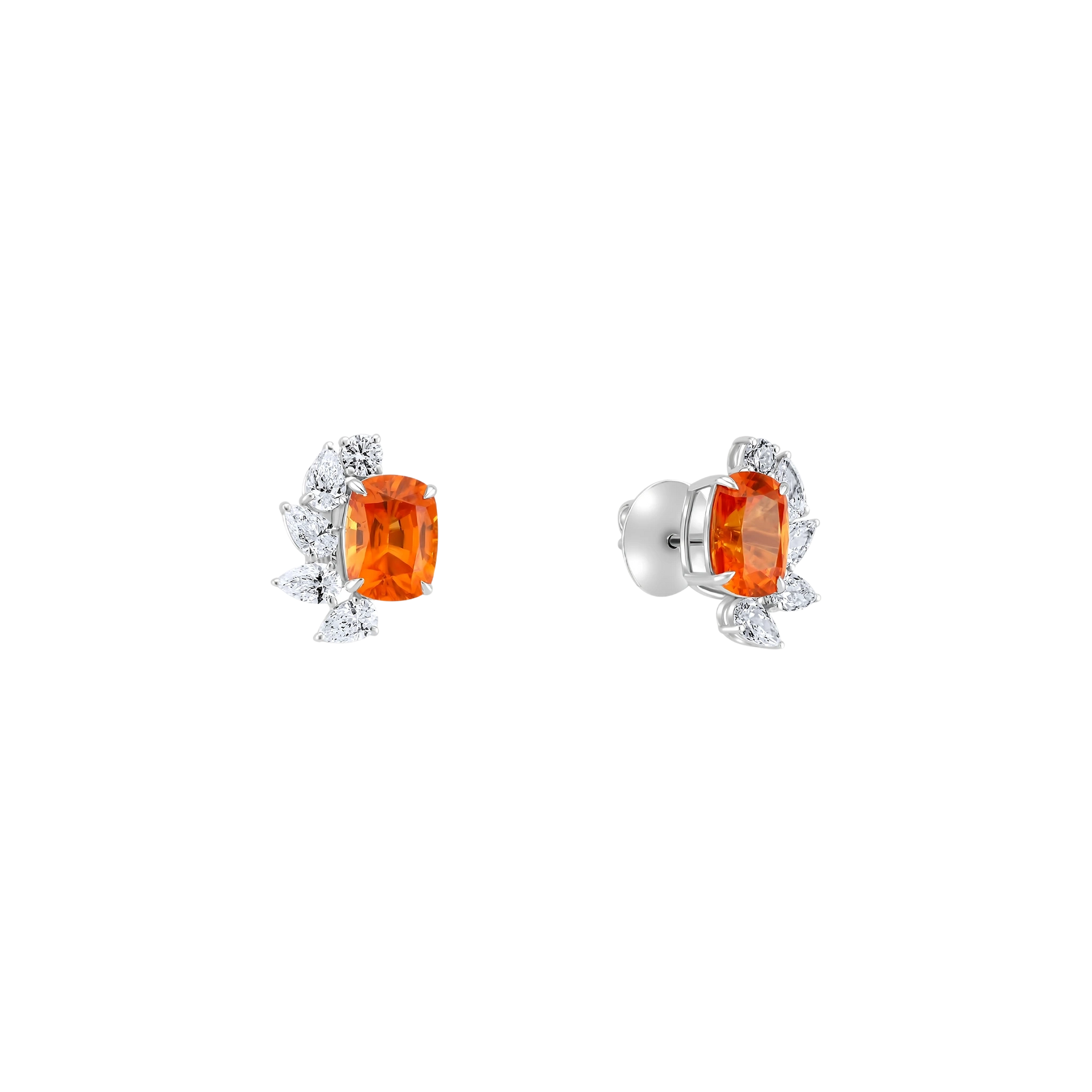 Pair of earrings with orange gemstones on a white background