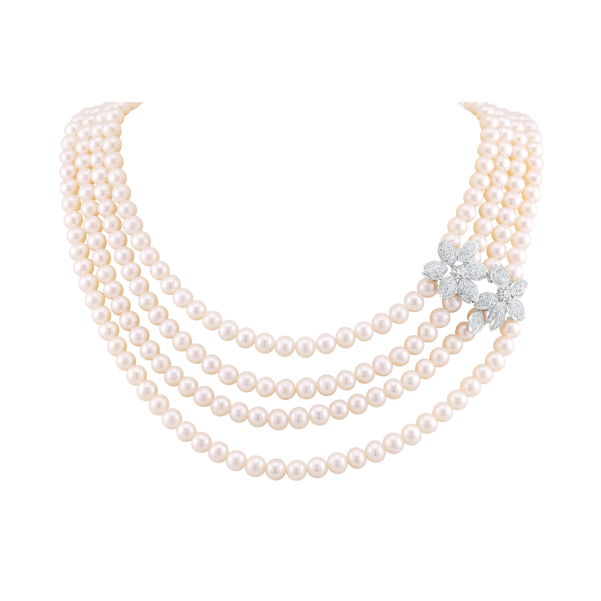 Three-strand pearl necklace with a diamond brooch on a white background