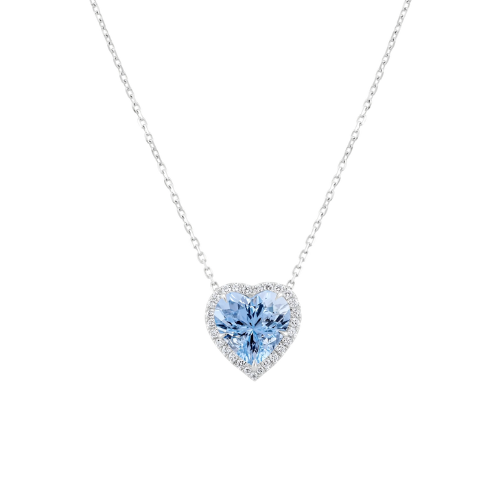 Heart-shaped blue gemstone necklace on a white background