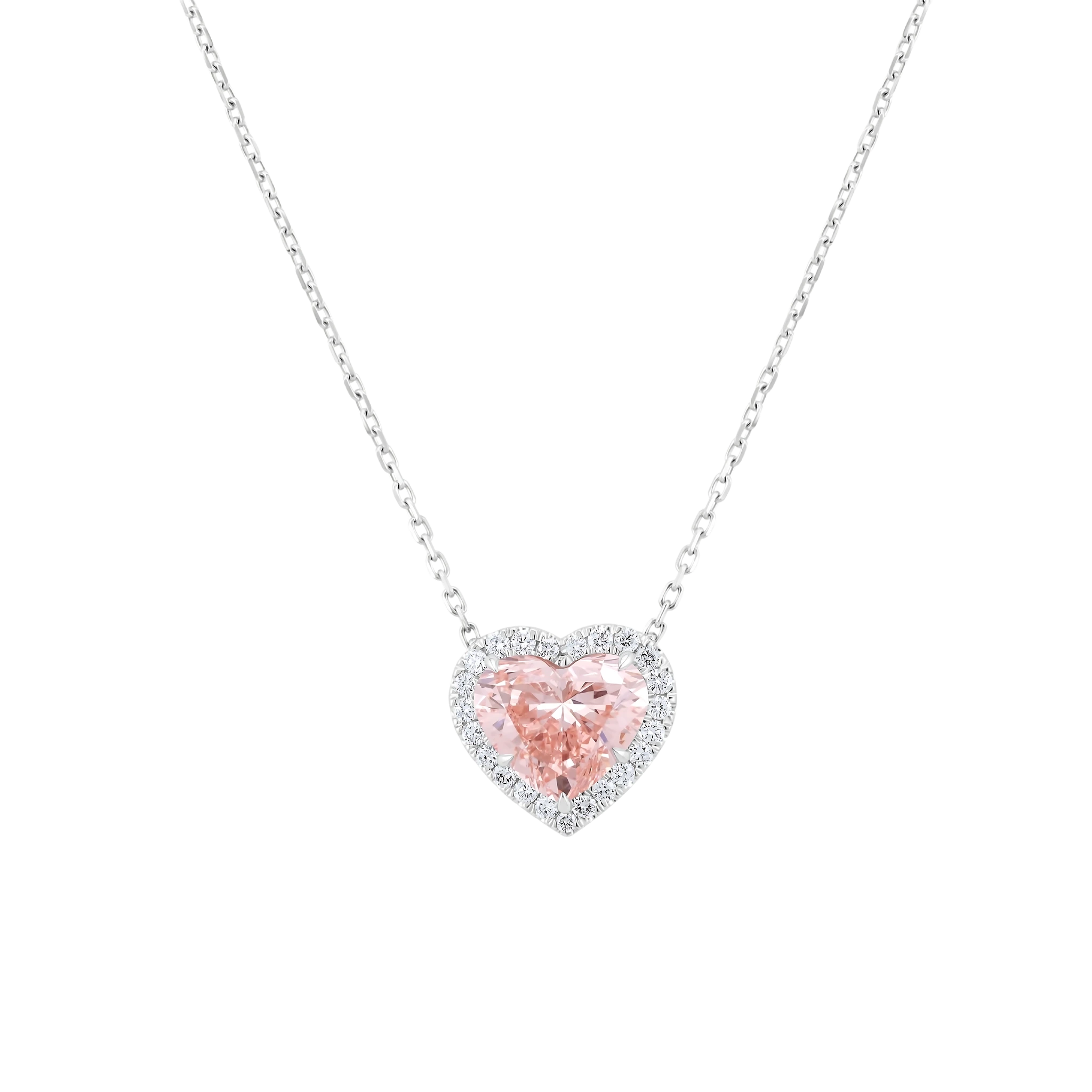 Heart-shaped pink gemstone necklace on a white background
