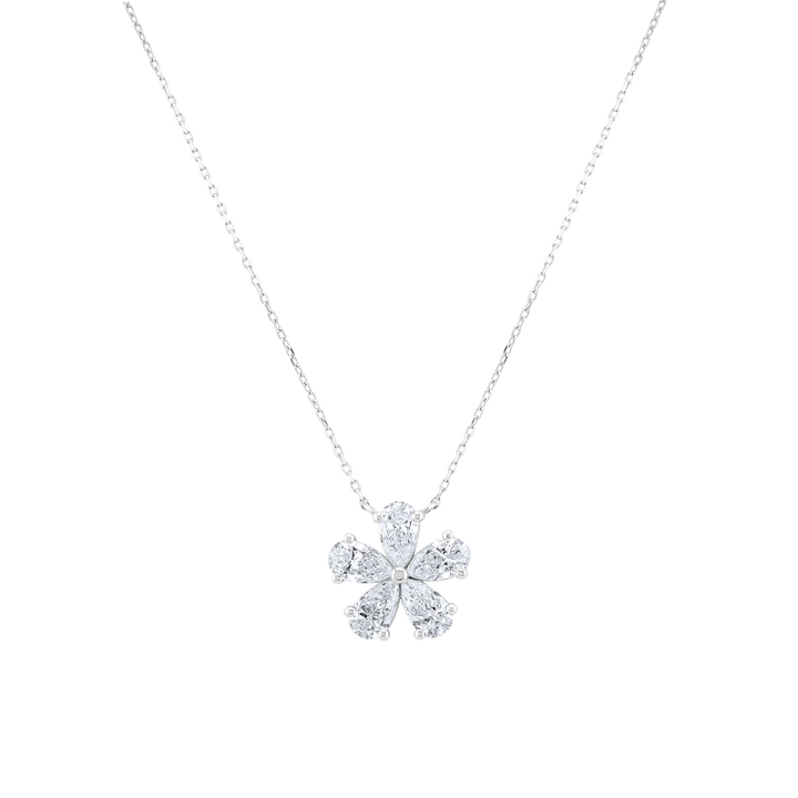 Silver necklace with a snowflake-shaped pendant on a white background