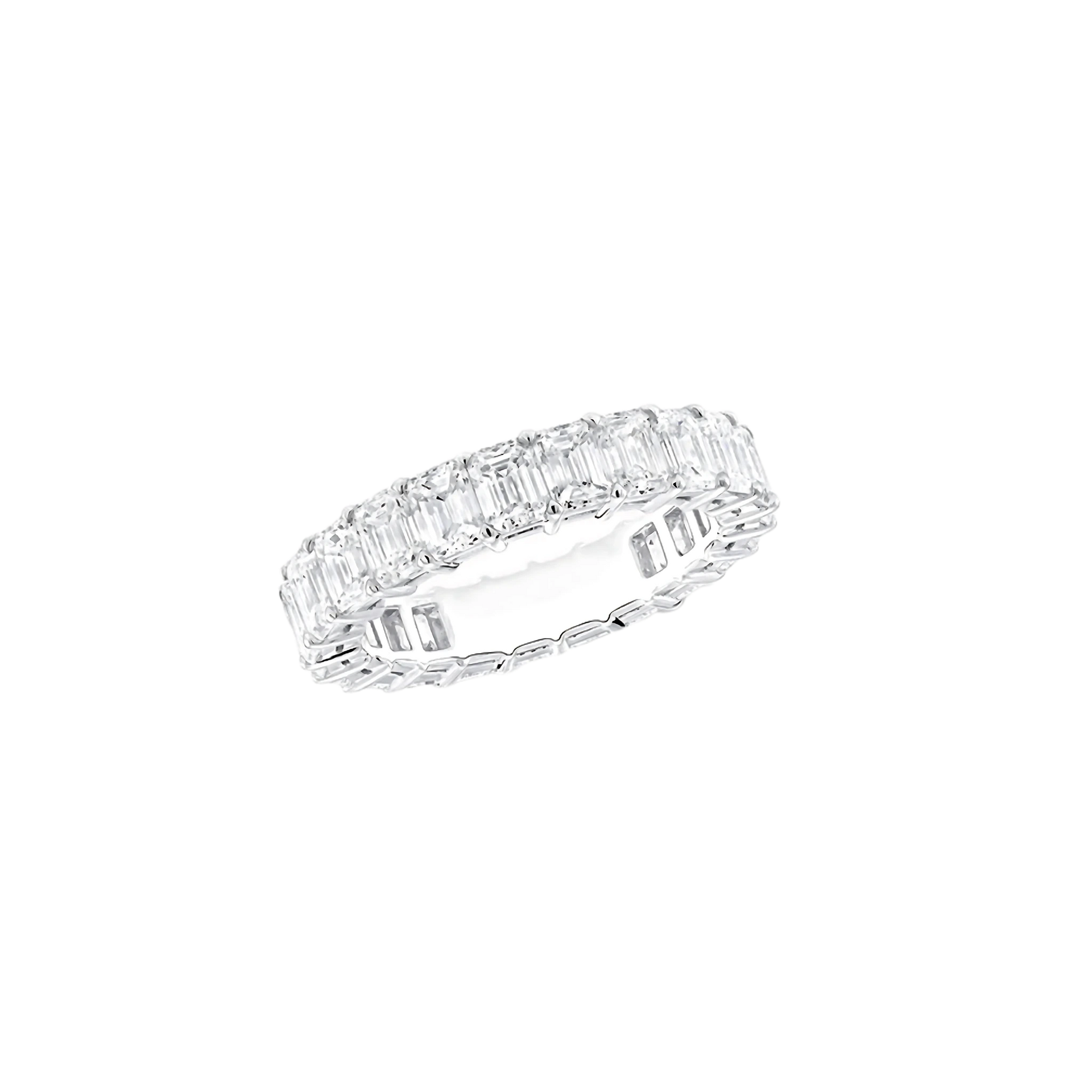 Diamond ring with emerald-cut stones on a white background
