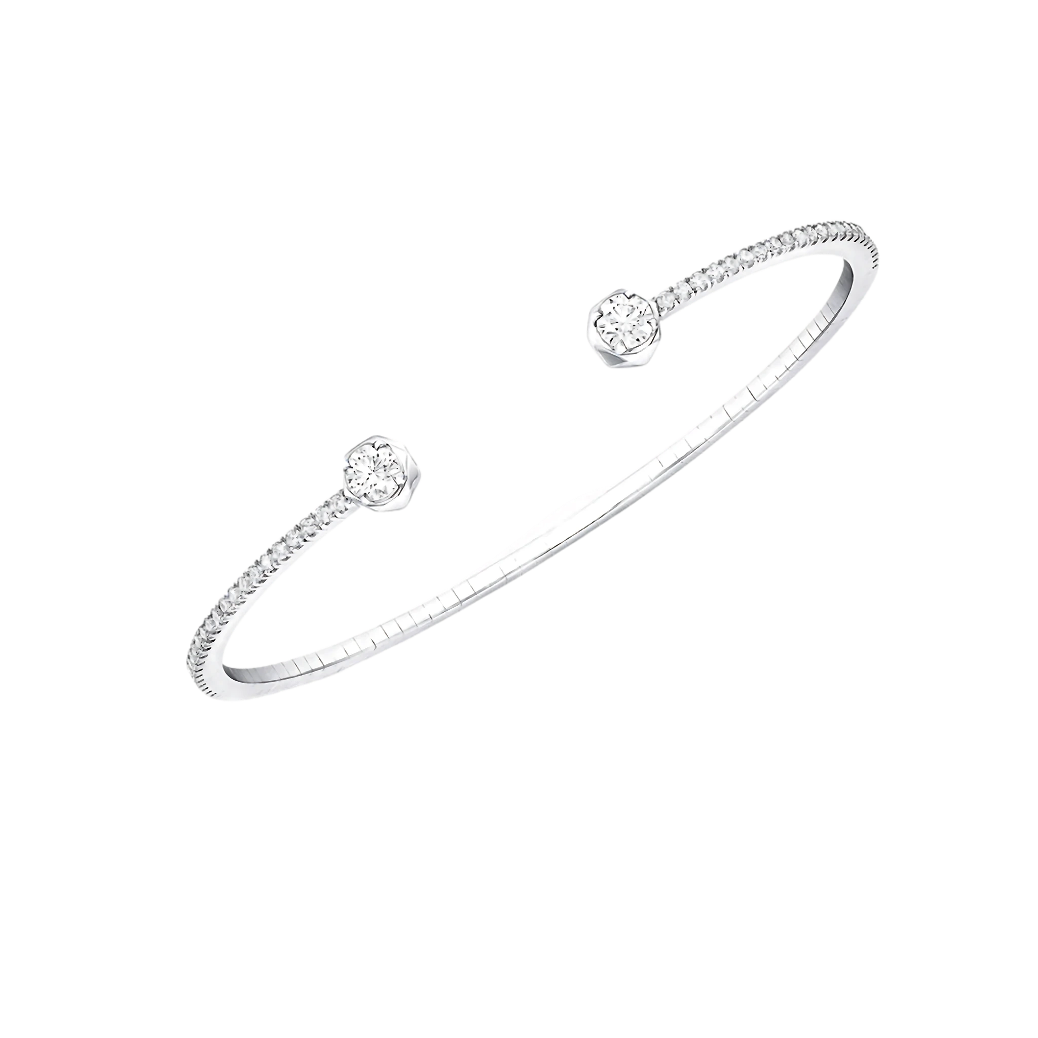 Silver bracelet with small diamonds on a white background