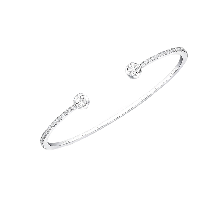 Silver bracelet with small diamonds on a white background