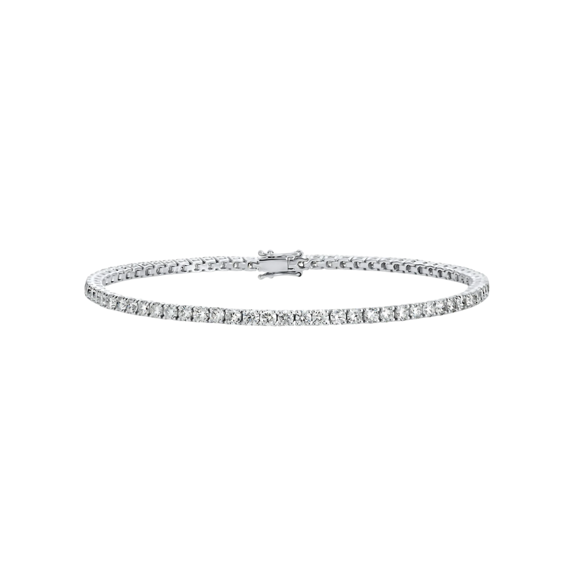 Silver bracelet with clear stones on a white background